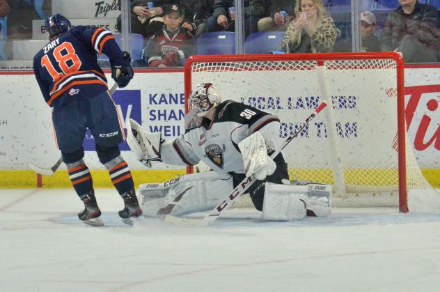 Vancouver Giants goaltender David Tendeck stops a Kamloops Blazers' penalty shot