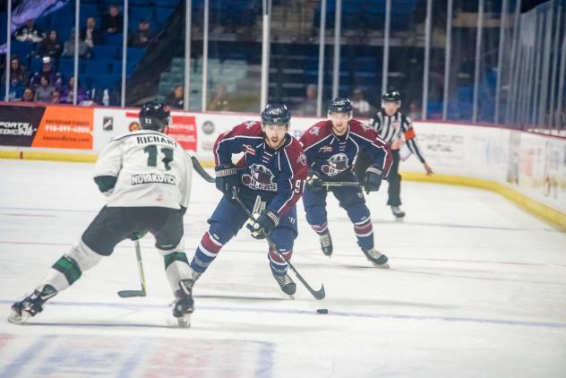 Tulsa Oilers forward Robby Jackson heads up ice against the Utah Grizzlies