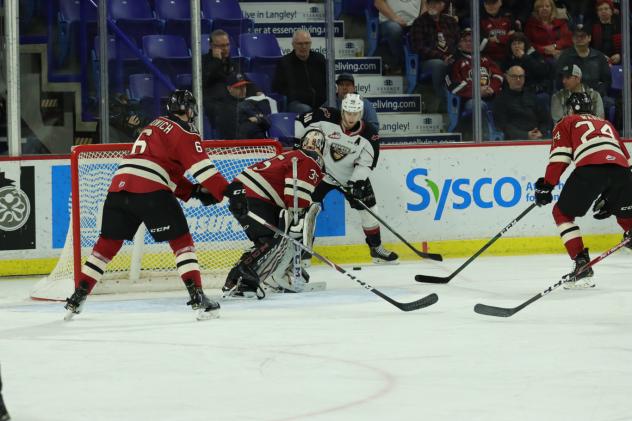 Vancouver Giants centre Milos Roman tests the Red Deer Rebels defense