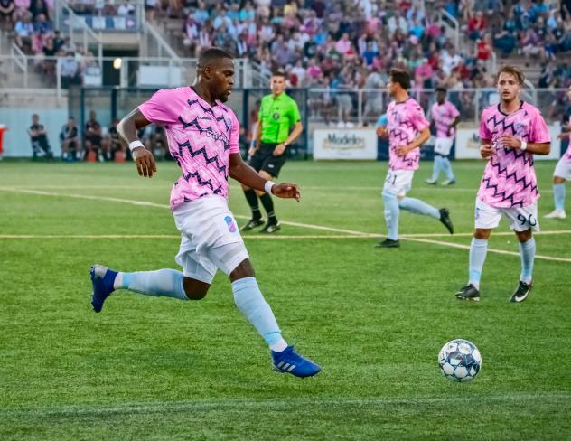 Forward Madison FC defender Josiah Trimmingham