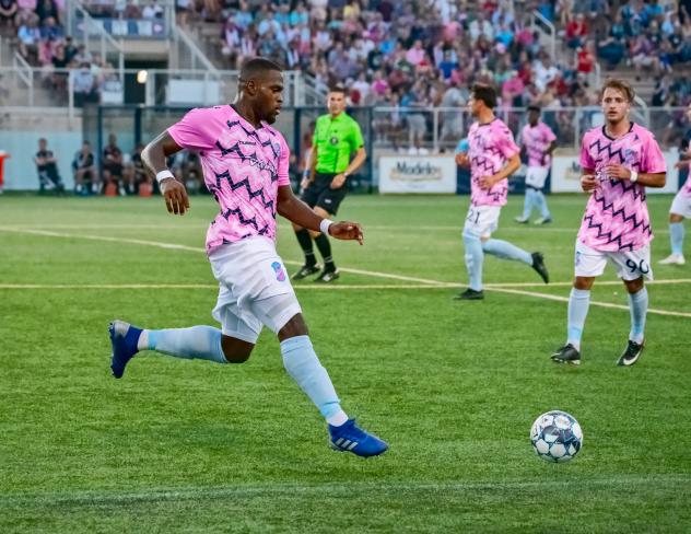 Forward Madison FC defender Josiah Trimmingham