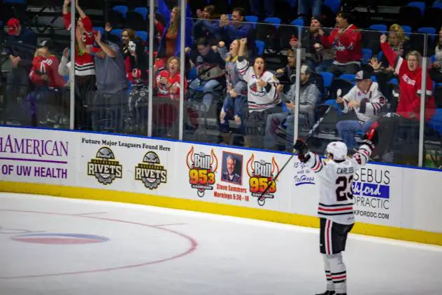 Rockford IceHogs defenseman Lucas Carlsson reacts after a goal