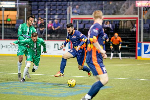 The Tacoma Stars' Alessandro Canale (89) looks to find Vince McCluskey vs. the Dallas Sidekicks