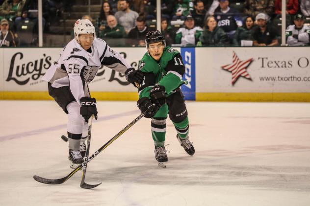 Andreas Borgman of the San Antonio Rampage (left) challenges Texas Stars forward Joel L'Esperance