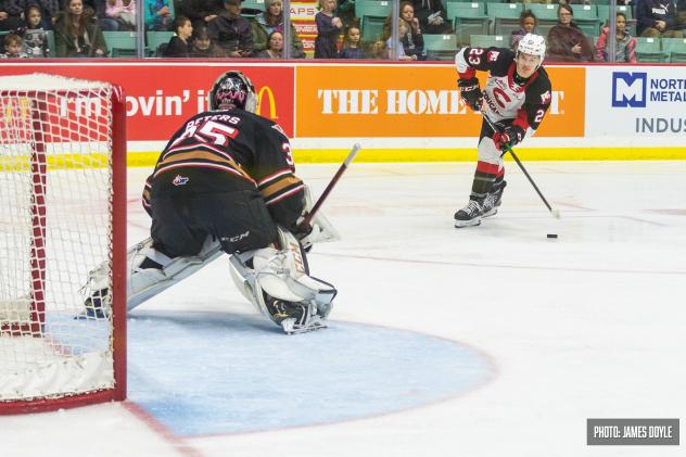 Prince George Cougars left wing Filip Koffer eyes the Calgary Hitmen goal