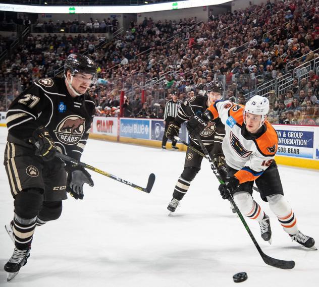 Lehigh Valley Phantoms forward Isaac Ratcliffe with the puck against the Hershey Bears