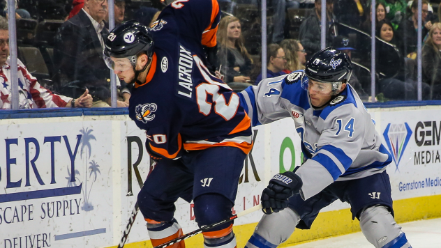 Cedric Lacroix of the Greenville Swamp Rabbits (left) vs. the Jacksonville IceMen