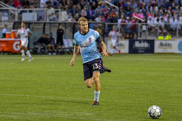 Forward Madison center back Connor Tobin