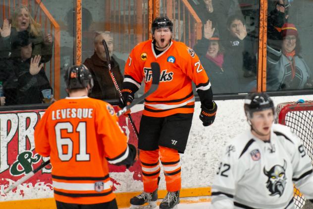 Danbury Hat Tricks forward Cory Anderson (center) reacts after a goal