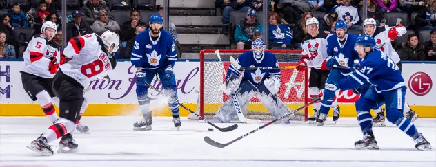 Binghamton Devils defenseman Josh Jacobs takes a shot against the Toronto Marlies