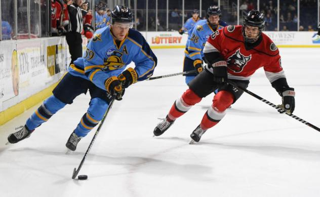 Atlanta Gladiators forward Eric Neiley (left) vs. the Adirondack Thunder