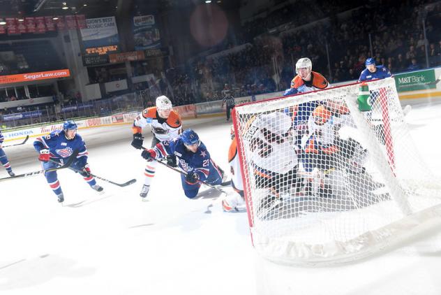 Lehigh Valley Phantoms goaltender Alex Lyon and his defense vs. the Rochester Americans