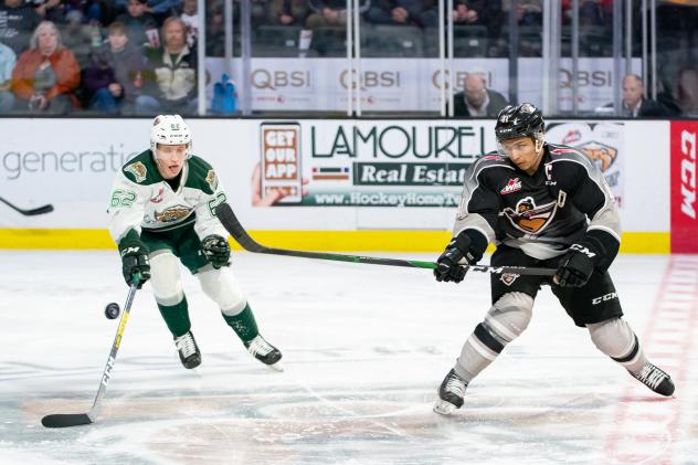 Vancouver Giants defenseman Alex Kannock Leipert (right) vs. the Everett Silvertips