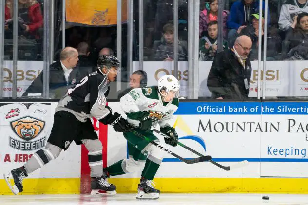 Vancouver Giants centre Justin Sourdif (left) against the Everett Silvertips