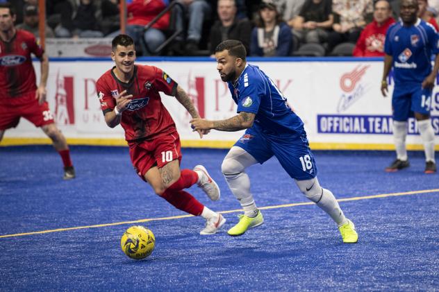 Ontario Fury midfielder Justin Stinson (left) defends against the Kansas City Comets