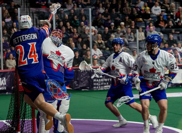 Toronto Rock defend against the Halifax Thunderbirds