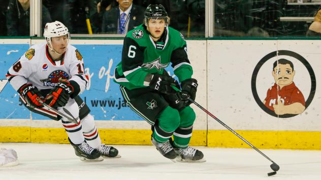 Texas Stars defenseman Ben Gleason (right) vs. the Rockford IceHogs