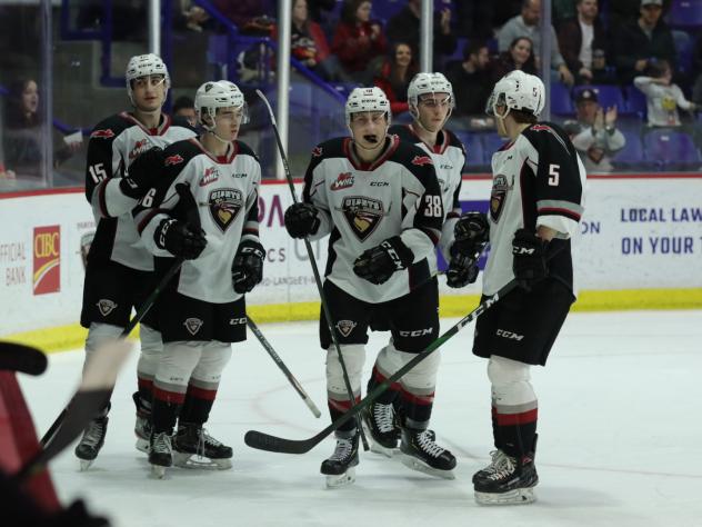 Vancouver Giants huddle up after a goal against the Victoria Royals