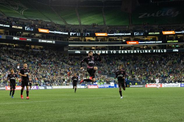 Joao Paulo of Seattle Sounders FC celebrates a goal against CD Olimpia in Scotiabank Concacaf Champions League play