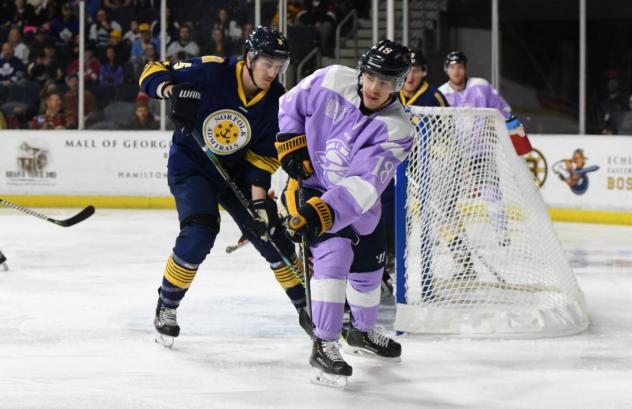 Atlanta Gladiators forward Samuel Asselin (right) vs. the Norfolk Admirals