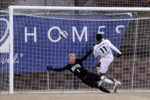 Mamadi Camara of Colorado Springs Switchbacks FC scores against the University of Denver
