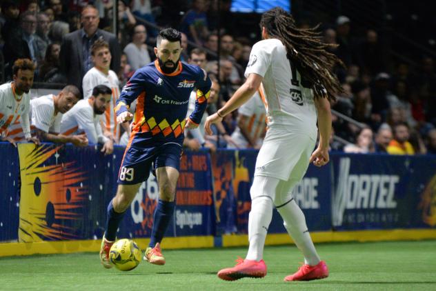 Tacoma Stars forward Alessandro Canale vs. the Florida Tropics' Drew Ruggles