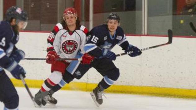 Forward Steven Fowler (right) with the Mentor Ice Breakers
