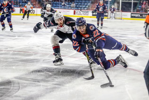 Vancouver Giants defenceman Seth Bafaro (left) against the Kamloops Blazers