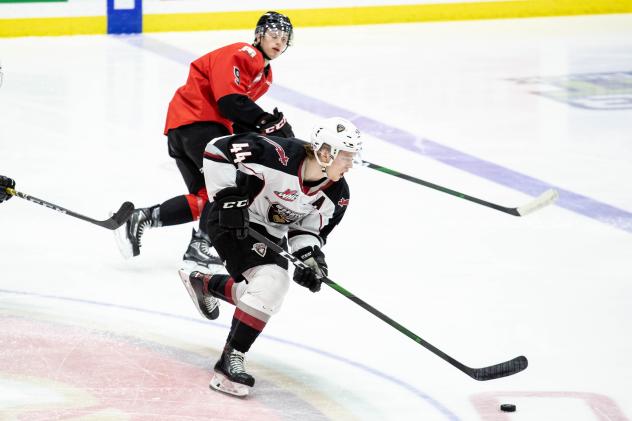 Vancouver Giants defenceman Bowen Byram handles the puck against the Prince George Cougars