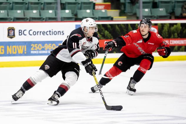 Vancouver Giants right wing Tyler Preziuso vs. the Prince George Cougars