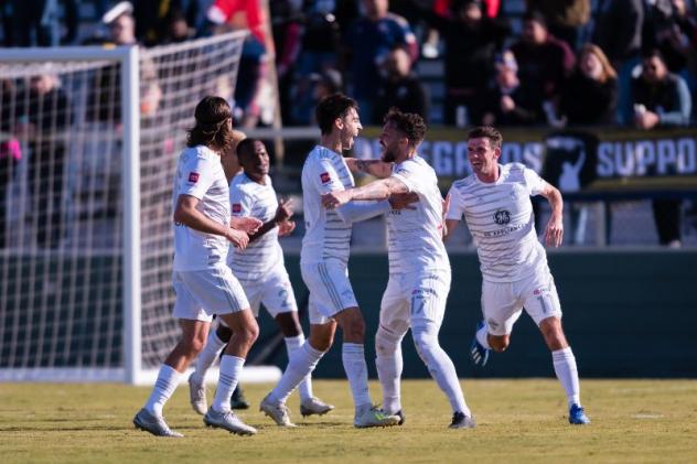 Cameron Lancaster and Louisville City FC celebrate his goal