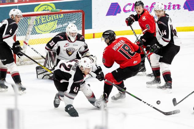 Vancouver Giants goaltender Drew Sim and his defence vs. the Prince George Cougars