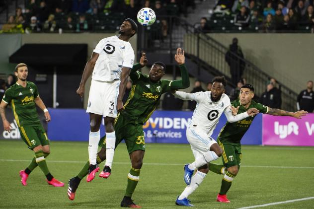 Minnesota United FC defender Ike Opara goes high for a ball
