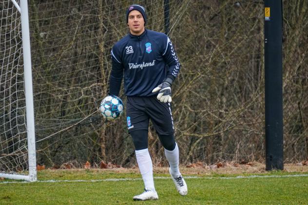 Forward Madison FC goalkeeper Philipp Marceta