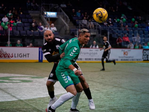 Dallas Sidekicks defender Kristian Quintana (in green)