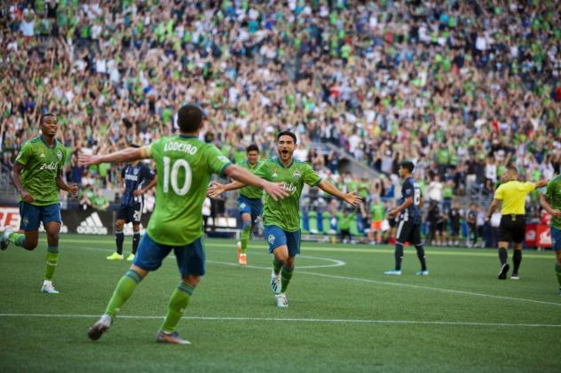 Seattle Sounders FC celebrate a goal against the LA Galaxy on September 1, 2019