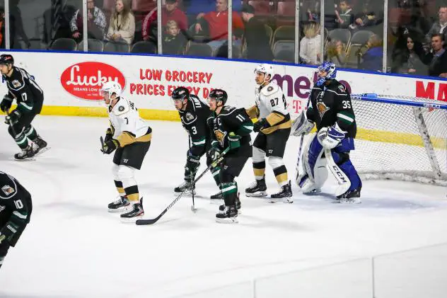 Utah Grizzlies goaltender Martin Ouellette (far right)