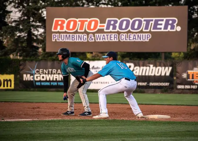 St. Cloud Rox first baseman Jack Kelly (right) keeps a Rochester Honkers base runner close