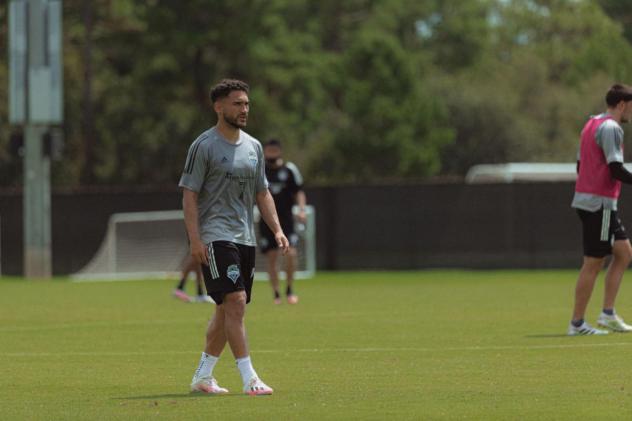 Cristian Roldan trains in Orlando with his Seattle Sounders FC teammates