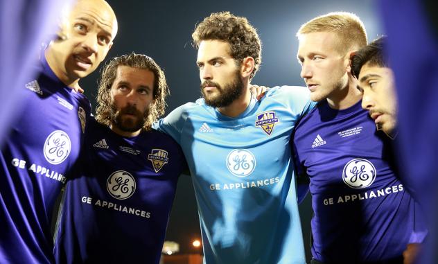 Louisville City FC huddle