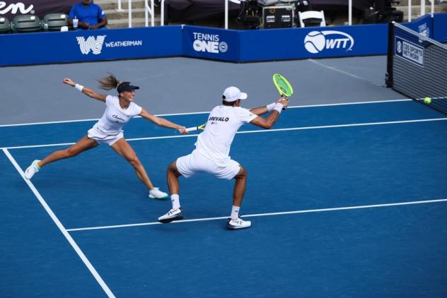 Washington Kastles doubles team of Marcelo Arevalo (right) and Bernarda Pera