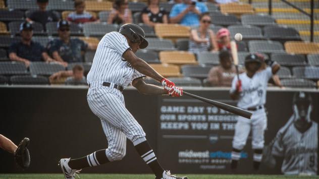 David Washington takes a big swing for the Milwaukee Milkmen