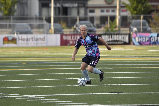 Forward Madison FC midfielder Eric Leonard vs. Greenville Triumph SC