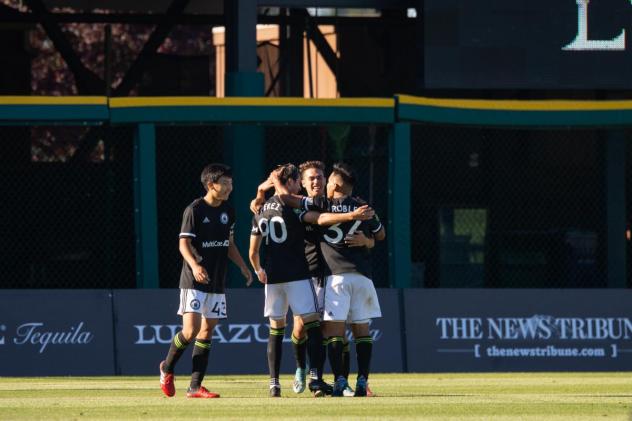 Tacoma Defiance celebrates a 3-0 win over Timbers 2 on July 18 at Cheney Stadium