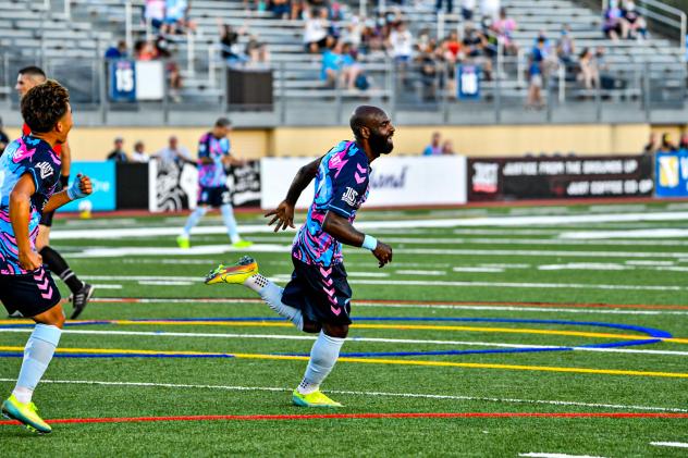 Forward Madison FC forward Don Smart reacts after a goal