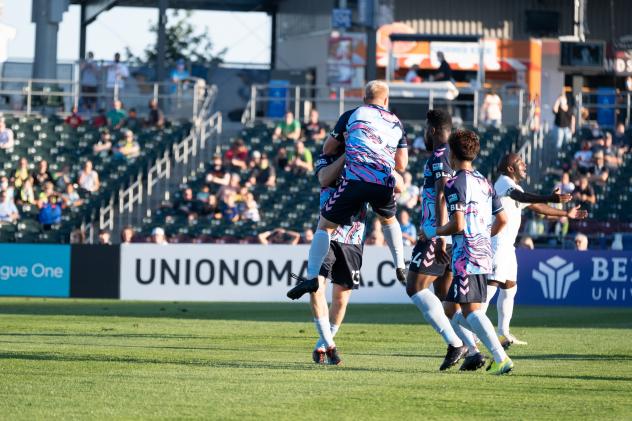 Forward Madison FC celebrate Eric Leonard's goal vs. Union Omaha