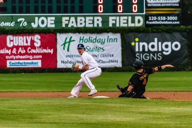 Jack Walker of the St. Cloud Rox trying to turn two