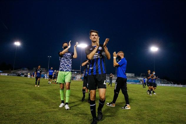 Colorado Springs Switchbacks FC walk off the pitch after tying El Paso Locomotive FC