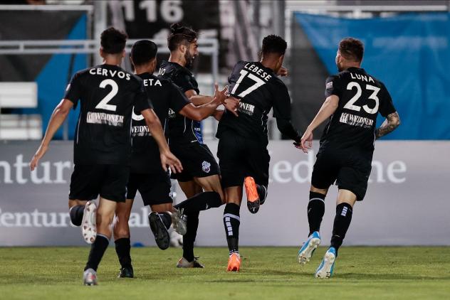 Colorado Springs Switchbacks FC celebrate George Lebese's game-tying goal