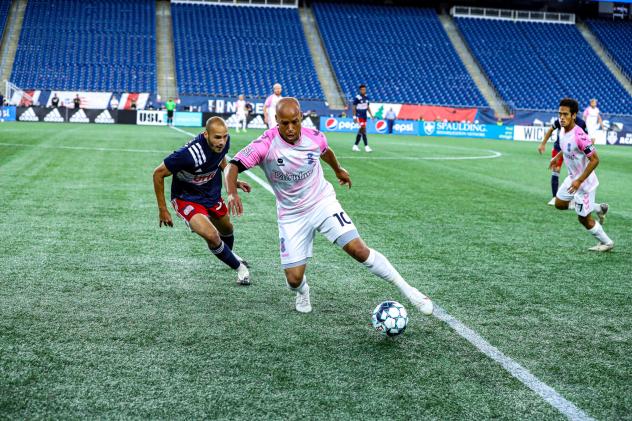 Forward Madison FC with possession vs. New England Revolution II